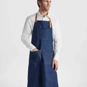 Grembiule Lungo in Denim – Cinturino con Bottone in Metallo e Tasche Multifunzione Grembiule Lungo in Denim – Cinturino con Bottone in Metallo e Tasche Multifunzione
